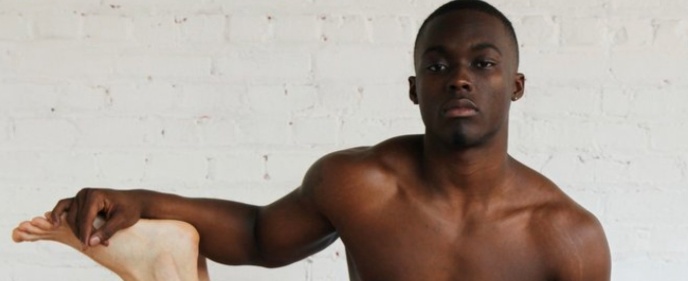 black_man_white_chair